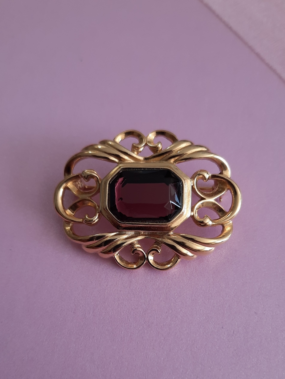 Gold-Tone Brooch with Deep Purple Center Stone